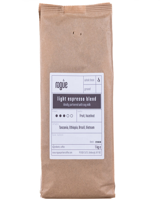 1kg kraft bag of light espresso blend roast whole bean coffee from Rogue Partner Coffee. Tasting notes are dark chocolate. The origins of the beans are Tanzania, Ethiopia, Brazil and Vietnam